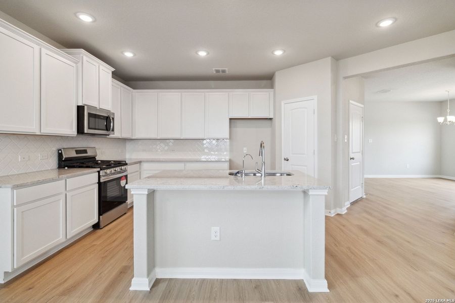 Furnished interior view inside a new home in Hunters Ranch, San Antonio (Image 5).