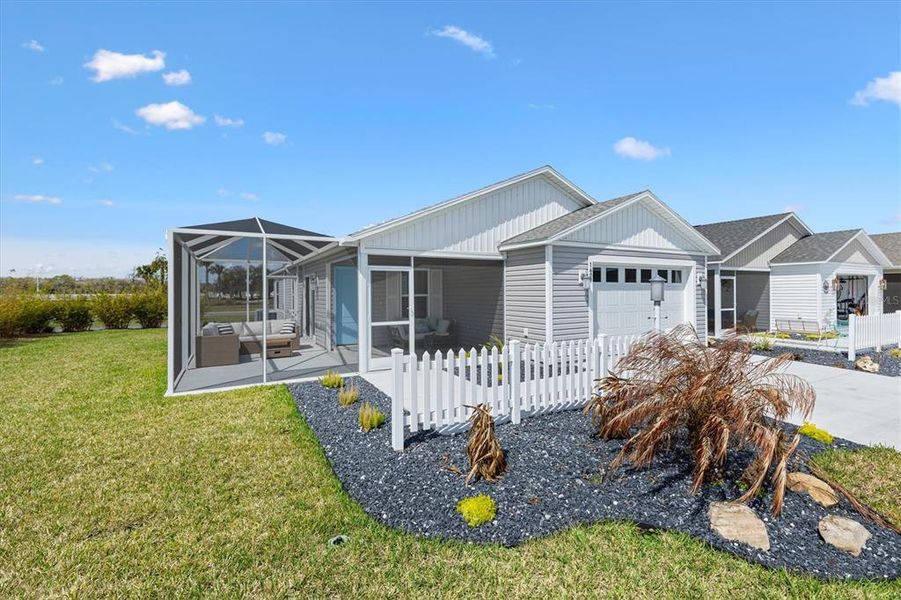 Front exterior of a new home in , The Villages, FL, highlighting curb appeal (Image 25). Front exterior of a new home in , The Villages, FL, highlighting curb appeal (Image 25).