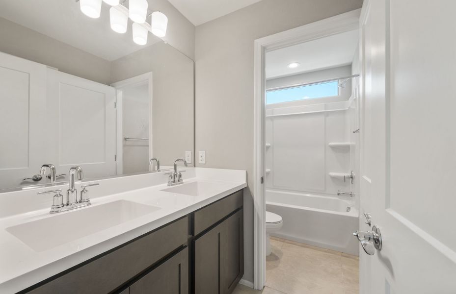 Representative furnished interior of a home built from the Yucca by Pulte Homes in Parkside at Anthem at Merrill Ranch, Florence (Image 10).