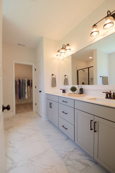 Representative furnished interior of a home built from the Beaufort by Stevens Fine Homes in Parkwood Estates, Leland (Image 10).