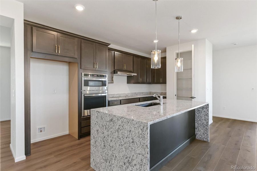Furnished interior view inside a new home in Legato, Commerce City (Image 6).
