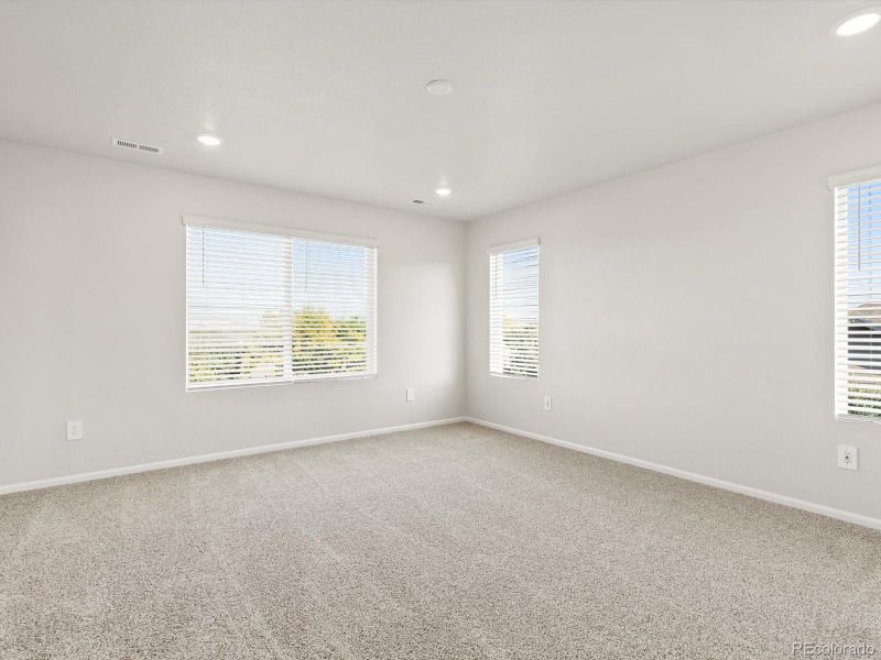 Spacious, unfurnished interior of a new home in Poudre Heights: The Lakes Collection, Windsor (Image 23).