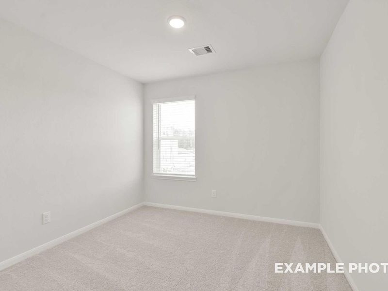 Spacious, unfurnished interior of a new home in Caney Creek Place, Conroe (Image 27).