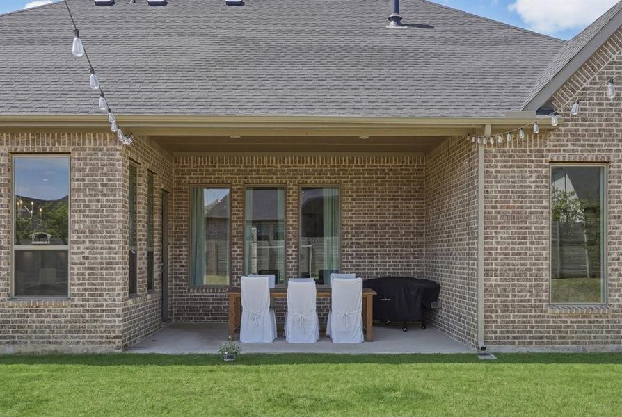 Exterior details and patio area of a home in , Argyle (Image 3). Exterior details and patio area of a home in , Argyle (Image 3).