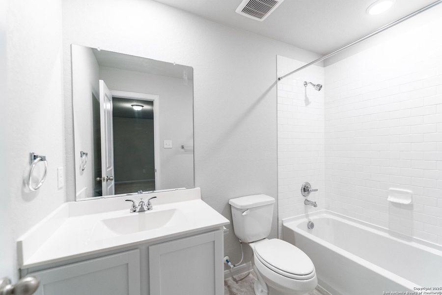 Furnished interior view inside a new home in Hennersby Hollow, San Antonio (Image 10).