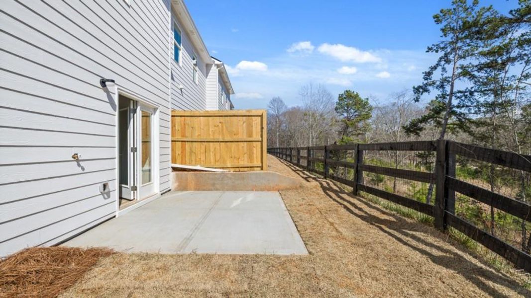 Exterior details and patio area of a home in Falcon Landing, Gainesville (Image 3).