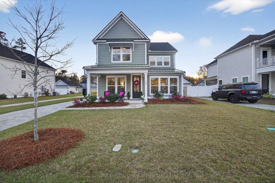 Front exterior of a new home in Pineland Village, Summerville, SC, highlighting curb appeal (Image 24).