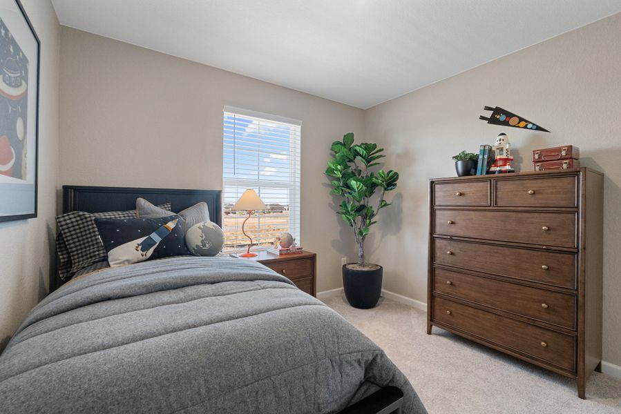 Representative furnished interior of a home built from the 4005 by Risewell Homes in Harvest Crossing, Aurora (Image 11).