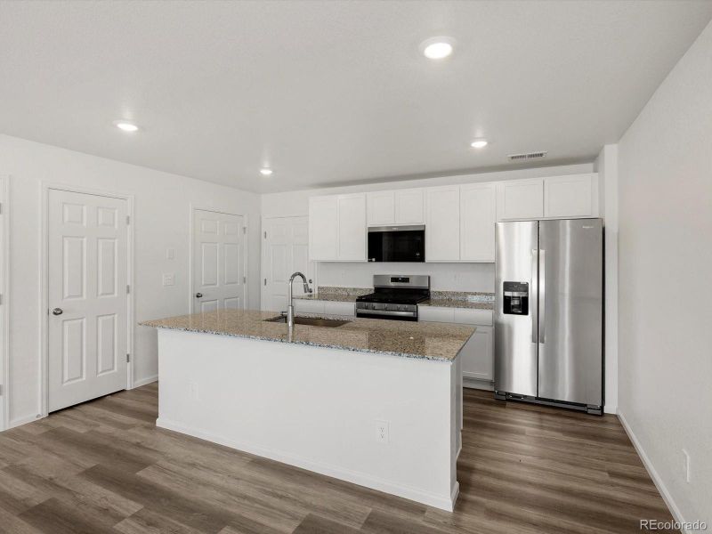 Furnished interior view inside a new home in , Aurora (Image 12).