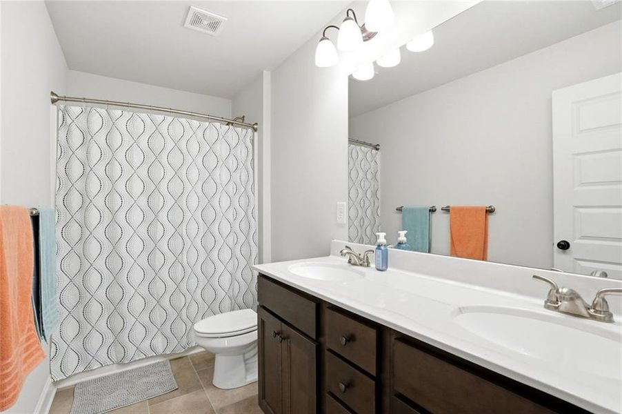 Furnished interior view inside a new home in Calgary Downs, Winder (Image 32). Furnished interior view inside a new home in Calgary Downs, Winder (Image 32).