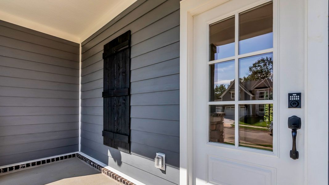 Exterior details and patio area of a home in Brush Creek, Fairview (Image 3).