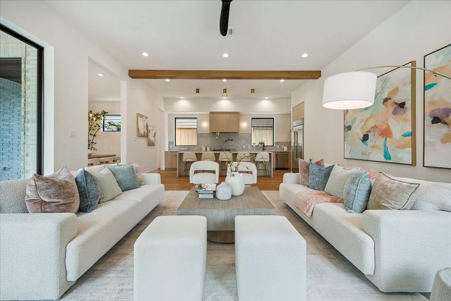 Living room - offers wood flooring and ample lighting from the backyard. Living room - offers wood flooring and ample lighting from the backyard.