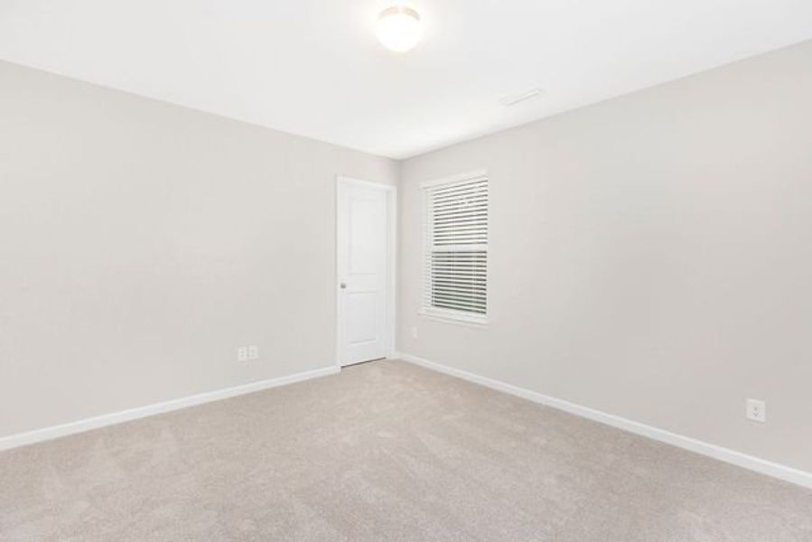Representative unfurnished interior of a home built from the Tate by True Homes in Beaver Creek, Statesville (Image 19).