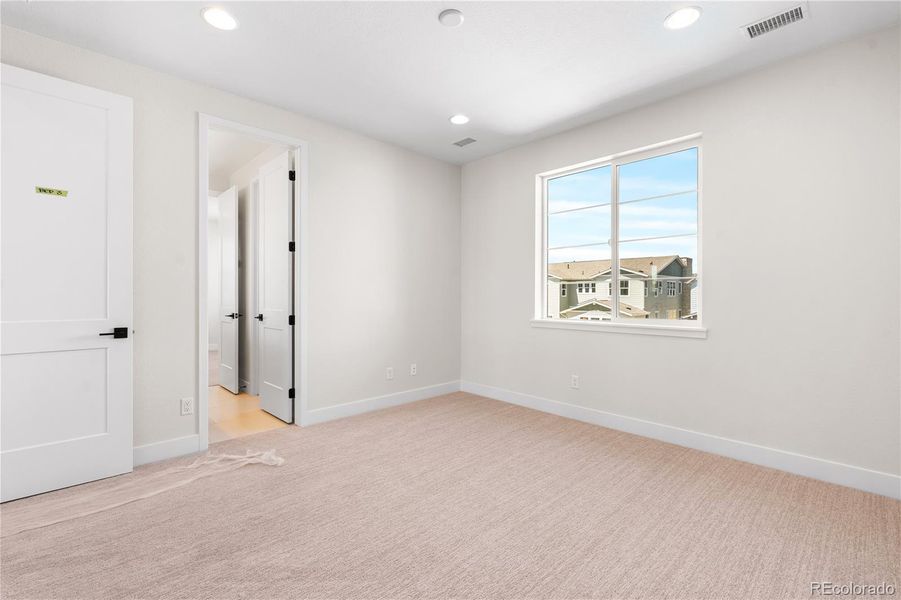 Spacious, unfurnished interior of a new home in Luxe at The Canyons, Castle Pines (Image 39).