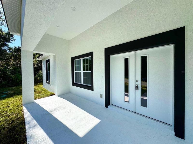 Exterior details and patio area of a home in , Citrus Springs (Image 17).