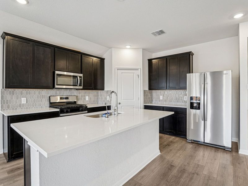 Furnished interior view inside a new home in Prairie Winds - Boulevard Collection, Hutto (Image 8).