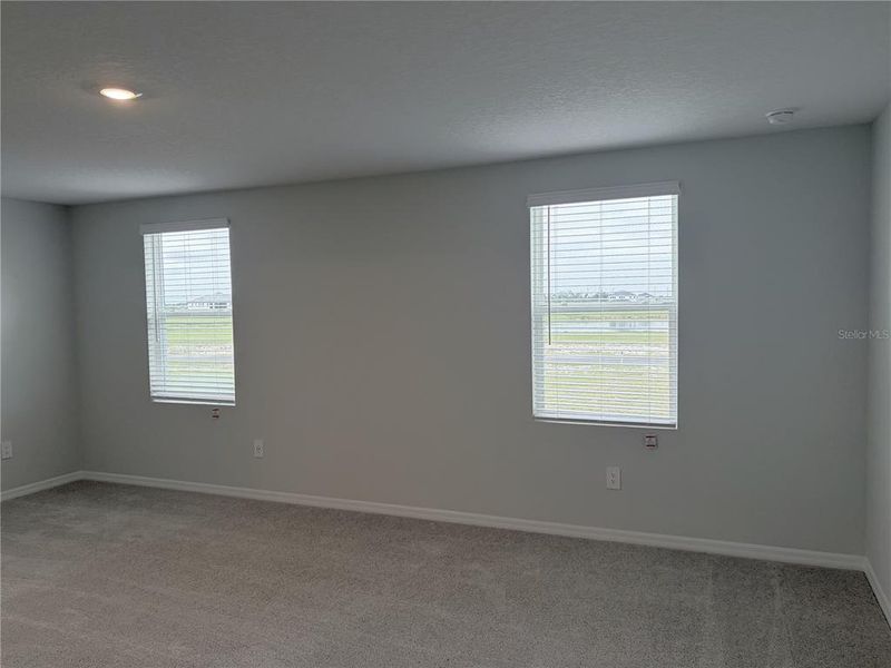 Spacious, unfurnished interior of a new home in Oakfield Trails, Parrish (Image 22).