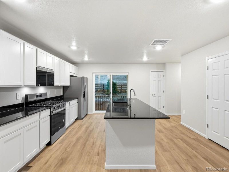 Furnished interior view inside a new home in Three Hills, Morrison (Image 16).