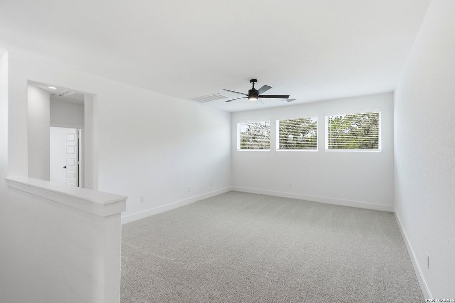 Spacious, unfurnished interior of a new home in The Reserve at Potranco Oaks, Castroville (Image 45).