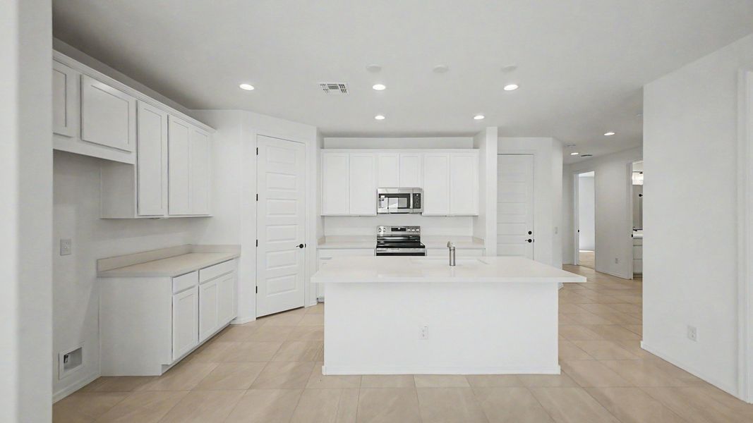 Representative furnished interior of a home built from the Acacia II by DRB Homes in Apache Farms, Buckeye (Image 11).