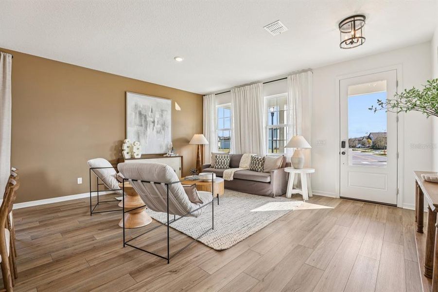 Furnished interior view inside a new home in Hawks Run, Kissimmee (Image 12).