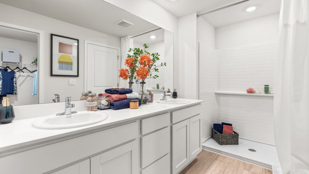 Representative furnished interior of a home built from the JEMISON by D.R. Horton in Coral Bay - Express & Tradition, North Fort Myers (Image 11).