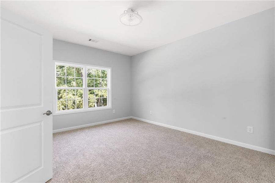 Spacious, unfurnished interior of a new home in , Gray (Image 49).