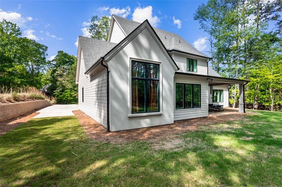 Front exterior of a new home in , Hoschton, GA, highlighting curb appeal (Image 23). Front exterior of a new home in , Hoschton, GA, highlighting curb appeal (Image 23).