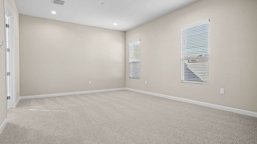 Spacious, unfurnished interior of a new home in Zanjero Pass, Waddell (Image 39).