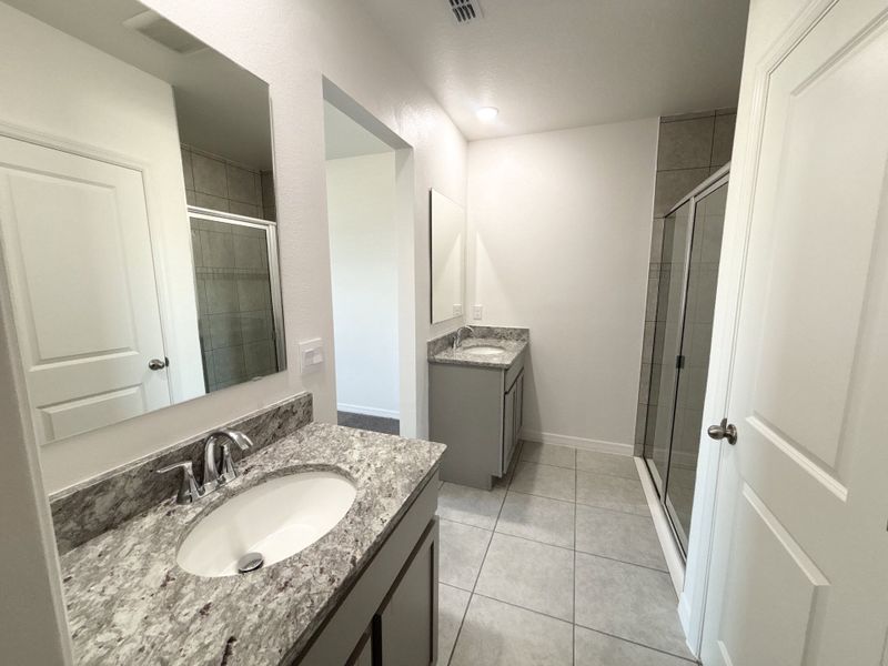 Furnished interior view inside a new home in Lake Deer Estates, Poinciana (Image 8).