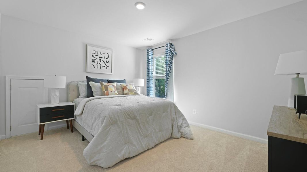 Furnished interior view inside a new home in Pine Hills at Cane Bay, Summerville (Image 24).
