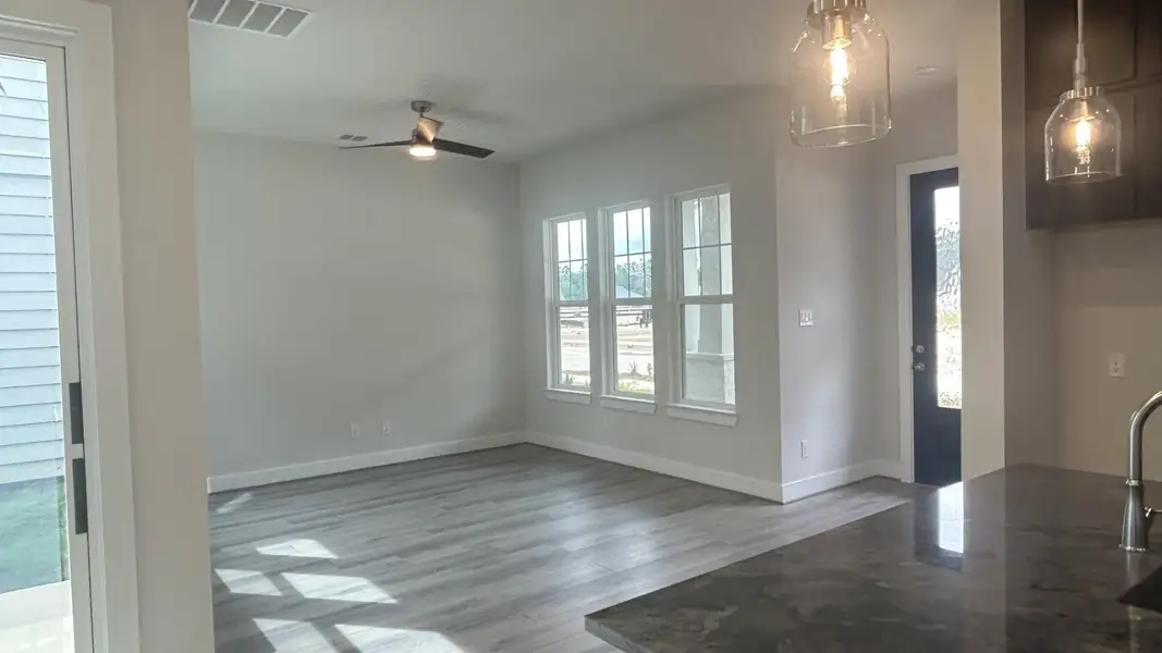 Spacious, unfurnished interior of a new home in Two Step Farm - Symphony Collection, Montgomery (Image 5). Spacious, unfurnished interior of a new home in Two Step Farm - Symphony Collection, Montgomery (Image 5).