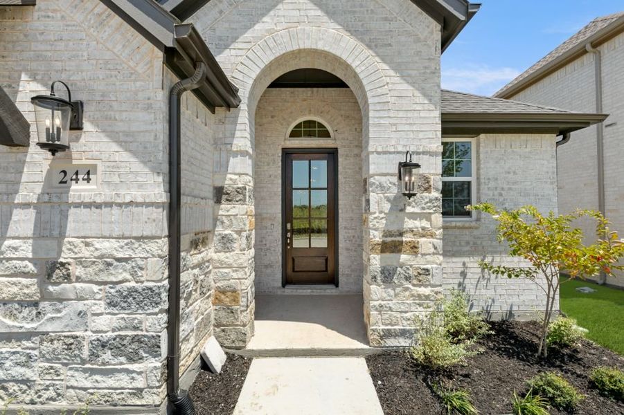 Representative exterior details of a home built from the Cypress by UnionMain Homes in Edgewater, Fate (Image 3).