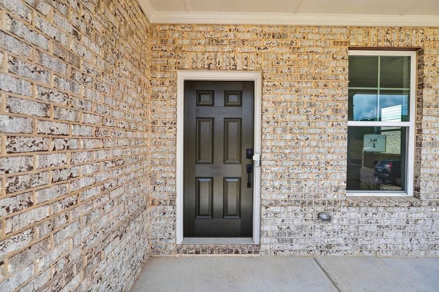 Exterior details and patio area of a home in Nichols Farm, Dacula (Image 3).