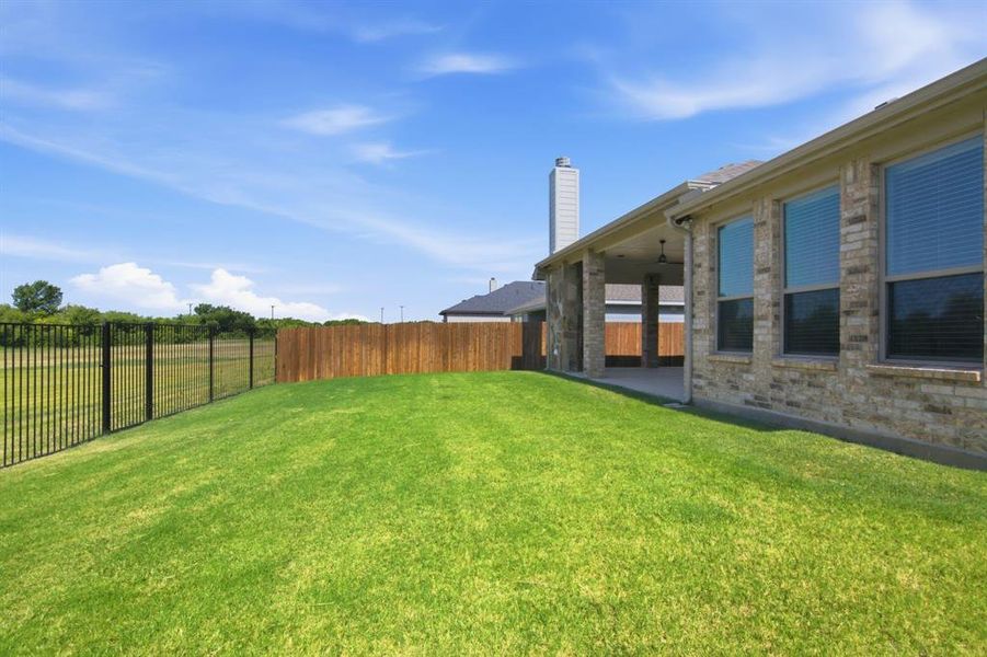 Exterior details and patio area of a home in , Burleson (Image 24).