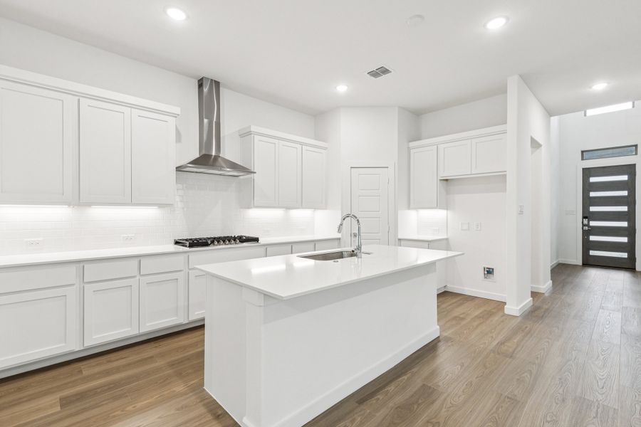 Kitchen in the Picasso II home plan by Trophy Signature Homes – REPRESENTATIVE PHOTO Kitchen in the Picasso II home plan by Trophy Signature Homes – REPRESENTATIVE PHOTO