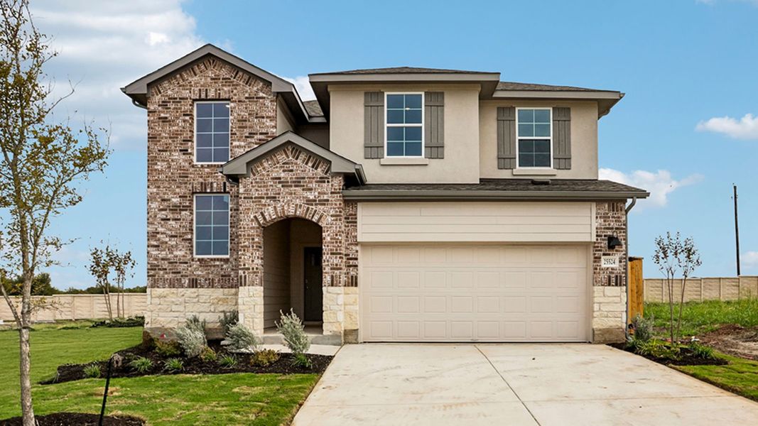 Front exterior of a new home in Briarwood, Elgin, TX, highlighting curb appeal (Image 2).