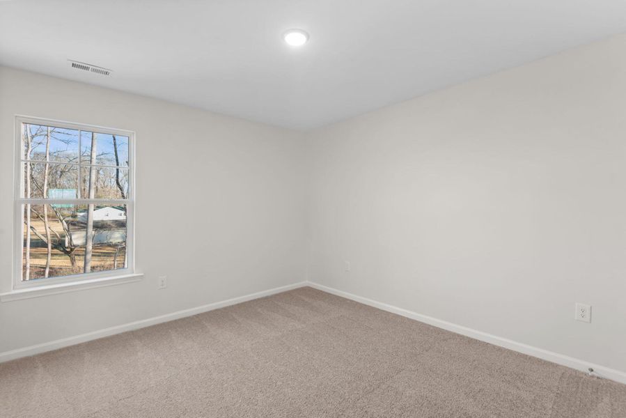 Spacious, unfurnished interior of a new home in Chandler Ridge, McLeansville (Image 32).