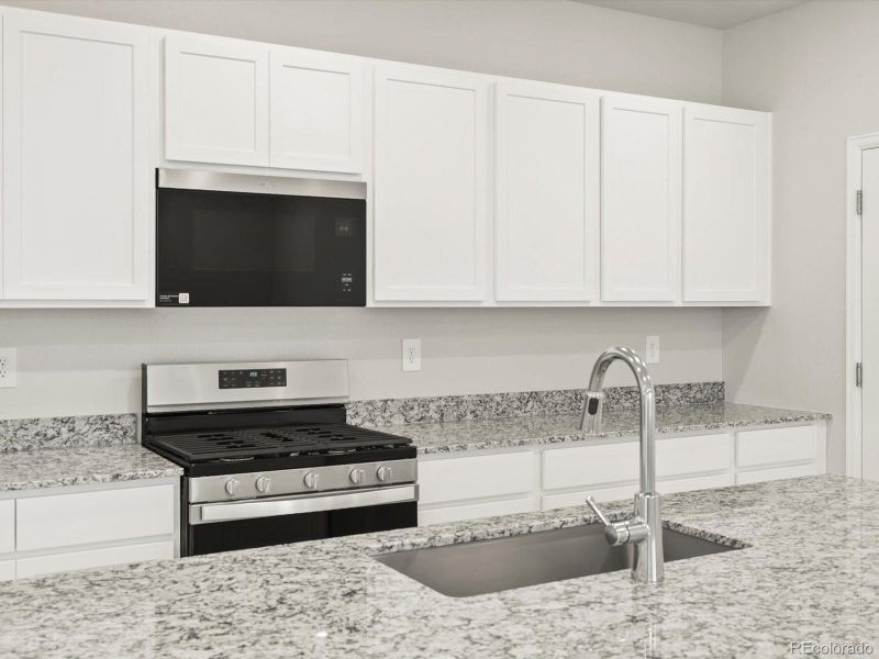 Furnished interior view inside a new home in Horizon Uptown: The Mountain Collection, Aurora (Image 11). Furnished interior view inside a new home in Horizon Uptown: The Mountain Collection, Aurora (Image 11).