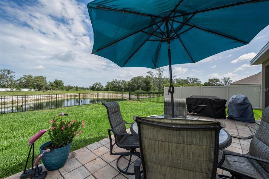 Exterior details and patio area of a home in Pine Creek, Spring Hill (Image 17). Exterior details and patio area of a home in Pine Creek, Spring Hill (Image 17).