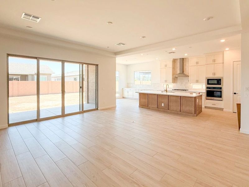 Great room, kitchen and dining