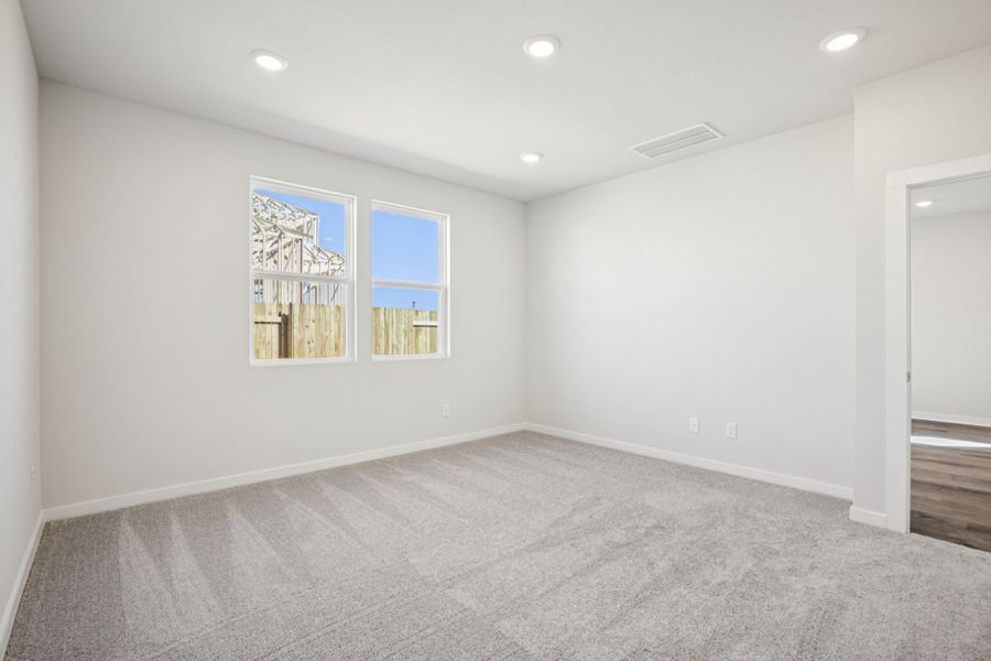 A room with a painting on the wall. A room with a painting on the wall.