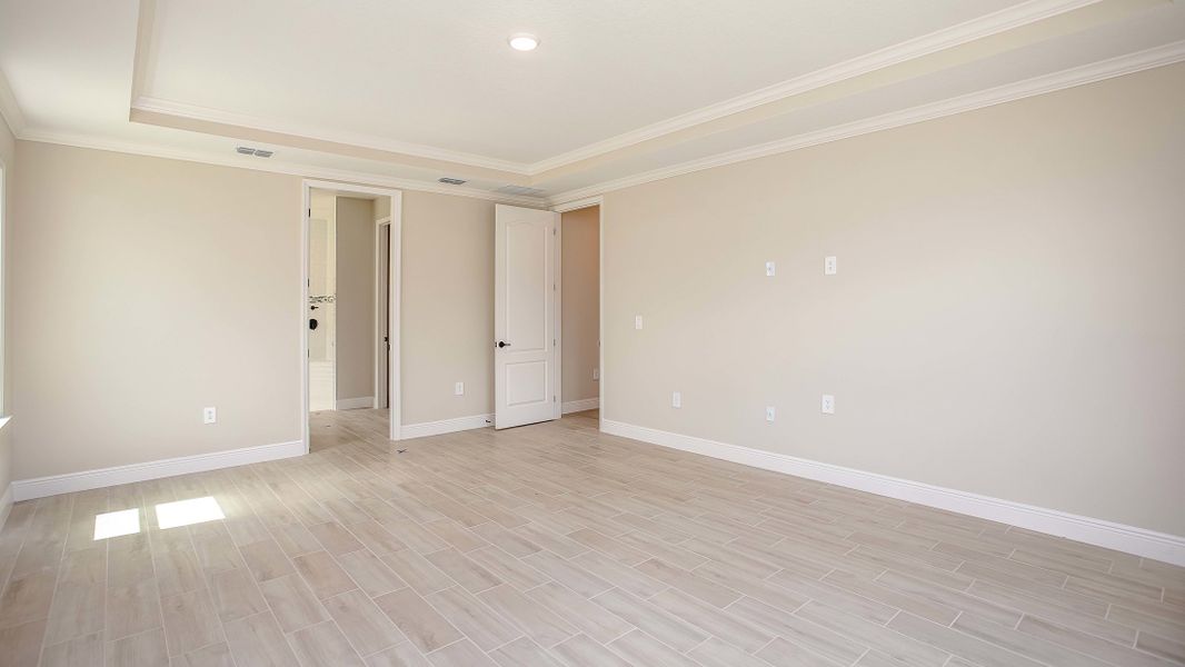 Representative unfurnished interior of a home built from the Verona by Maronda Homes in Eagle Crest, Grant-Valkaria (Image 13).