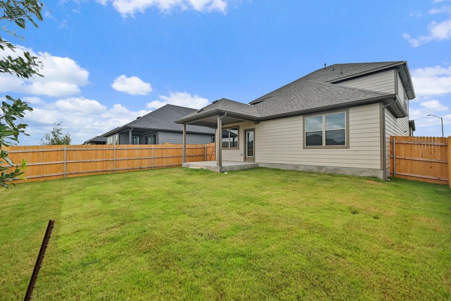 Exterior details and patio area of a home in Prairie Winds, Hutto (Image 22).