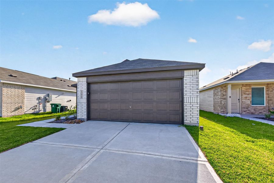 Front exterior of a new home in , Houston, TX, highlighting curb appeal (Image 20).