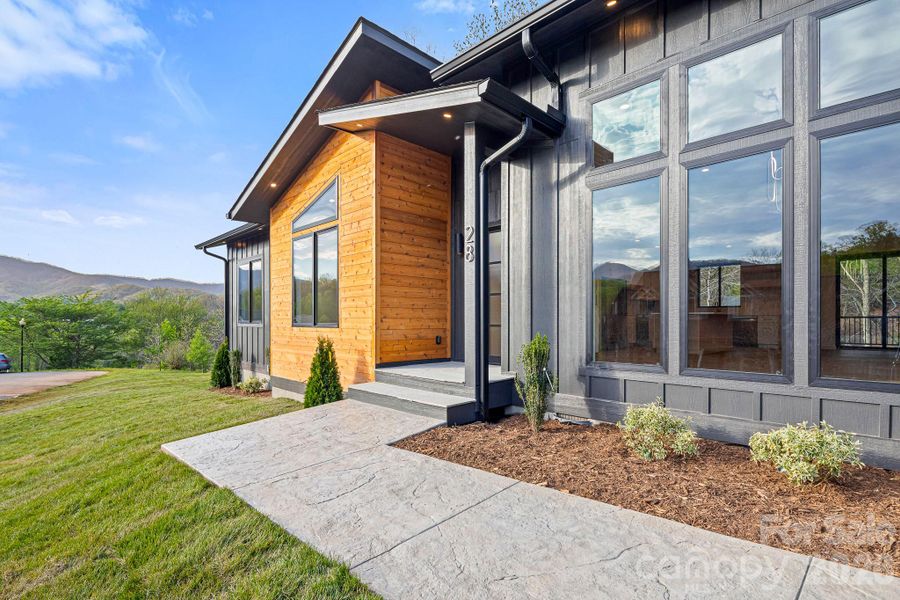 Exterior details and patio area of a home in , Candler (Image 26).