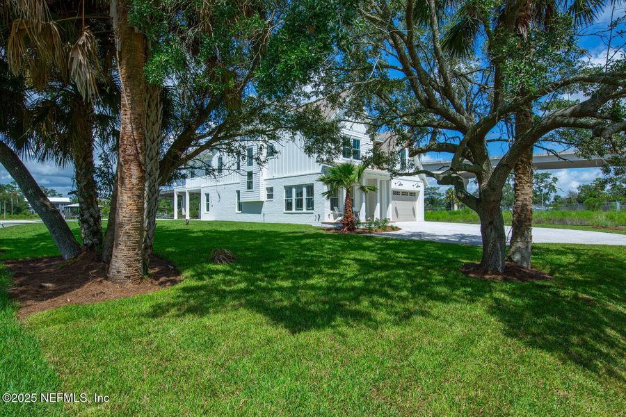 Front exterior of a new home in , Ponte Vedra Beach, FL, highlighting curb appeal (Image 19). Front exterior of a new home in , Ponte Vedra Beach, FL, highlighting curb appeal (Image 19).