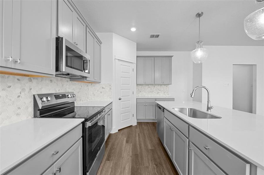 Please Note: These interior photos are not of the actual home but are of a completed one with a similar floor plan. Finishes, features, and layouts may vary.