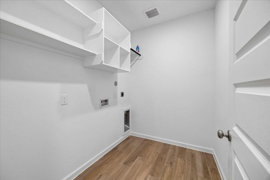 The utility room adds everyday function with built-in storage, wood-look tile & extra storage in a hall closet. Additionally, smart home & energy-saving features bring added peace of mind. Home had a 3rd-party Home Energy Rater testing to verify insulation, air tightness, duct sealing & overall energy performance, plus a GE ENERGY STAR stainless dishwasher, Nest Smart Thermostat E, Nest Hello video doorbell, smart light switches, Kwikset keyless entry with Z-wave & a Wi-Fi enabled garage door opener.