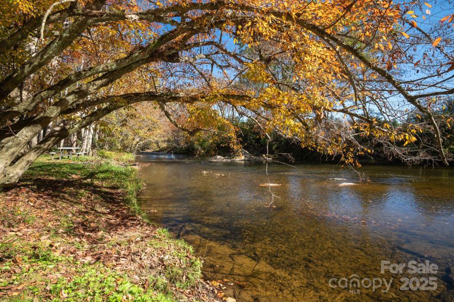 Community space/walking trail alongside the riverbank